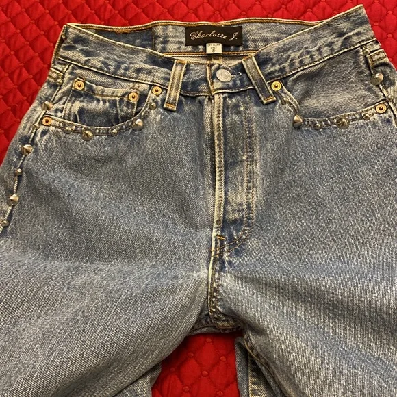 Vintage Levi’s redesign by Charlotte f with real feather detail o de legs sides